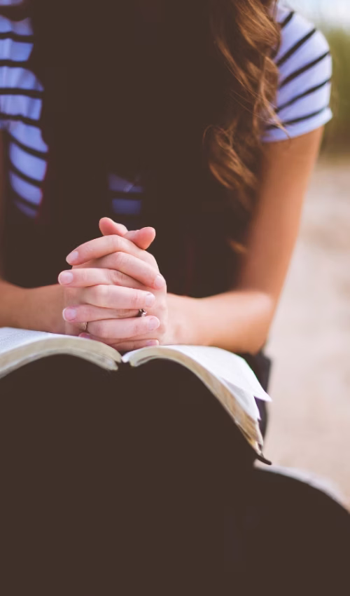 Woman praying for joy