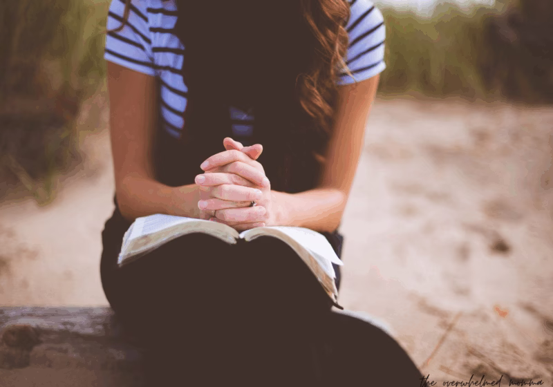 Woman praying for joy