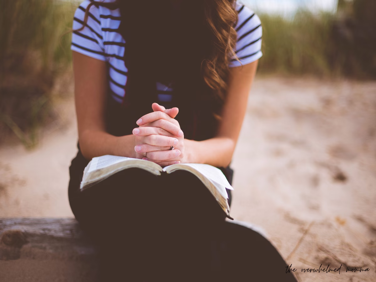 Woman praying for joy